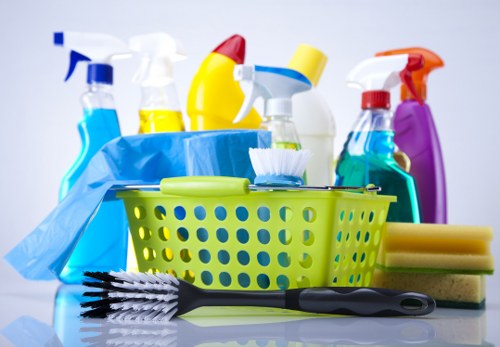 Cleaner preparing a kitchen for move-in cleaning